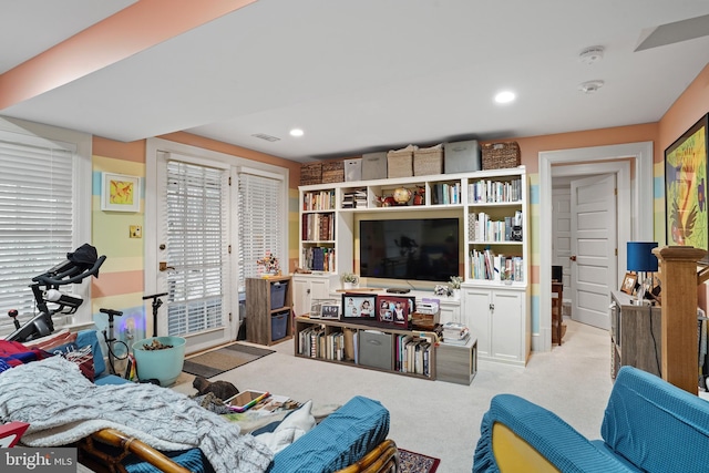 living room with light colored carpet