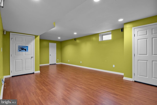 basement with wood-type flooring