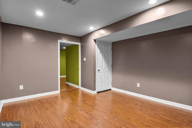 basement featuring light hardwood / wood-style flooring