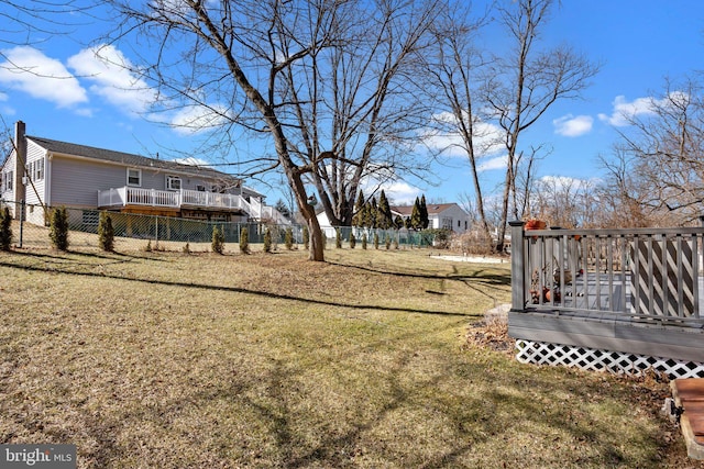 view of yard with a deck