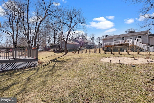 view of yard featuring a deck