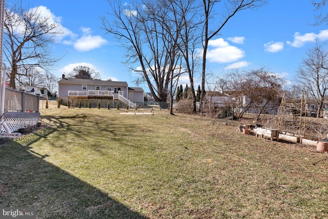 view of yard with a deck