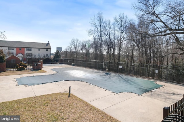 view of swimming pool featuring a patio