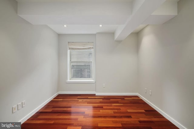 empty room featuring hardwood / wood-style floors