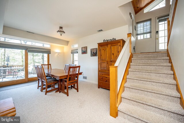 3084 Lake Shore Dr, Oakland, MD 21550 - dining space featuring stairway, visible vents, carpet flooring, and baseboards