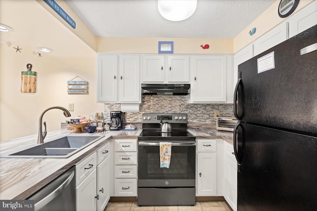 kitchen featuring stainless steel appliances, sink, and white cabinets