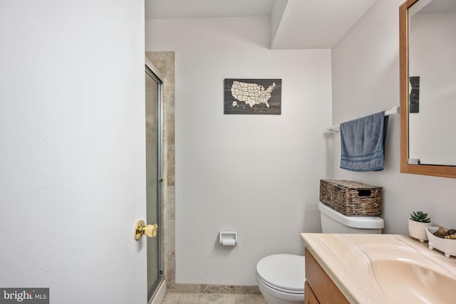 full bathroom with tile patterned flooring, a shower stall, baseboards, toilet, and vanity