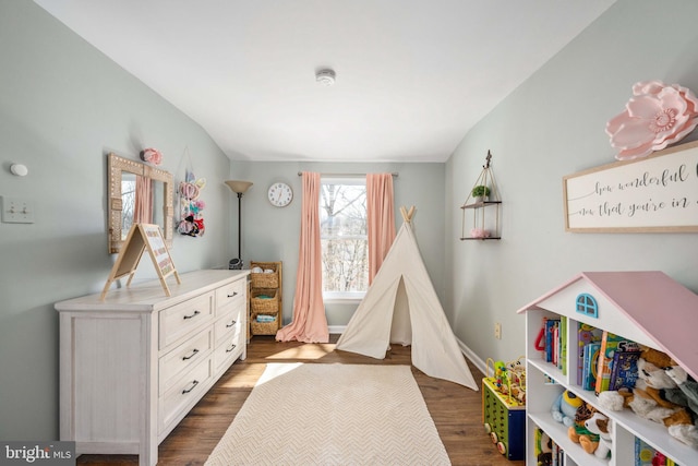 rec room featuring dark wood-style floors and baseboards