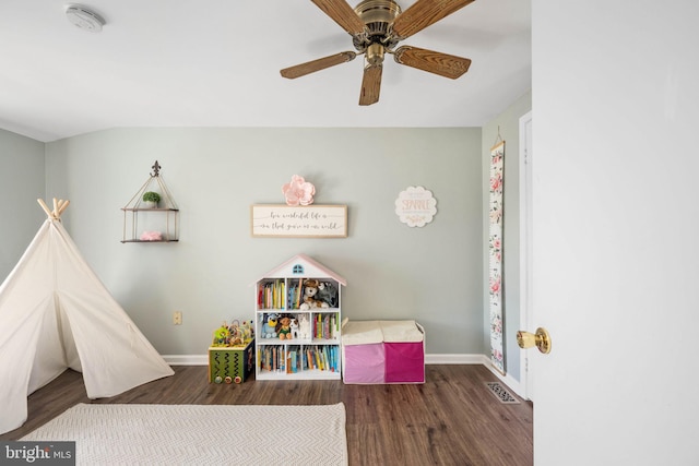 rec room featuring visible vents, wood finished floors, and baseboards