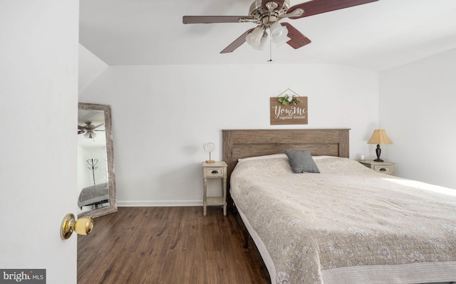 bedroom with baseboards, wood finished floors, and a ceiling fan