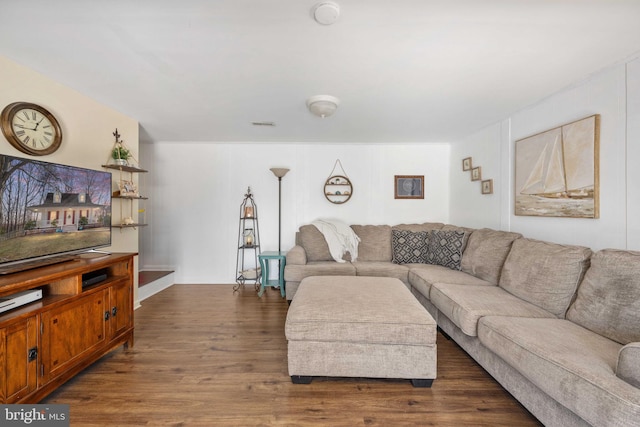 living room featuring dark wood-style floors