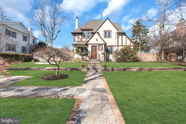 tudor house with a front yard