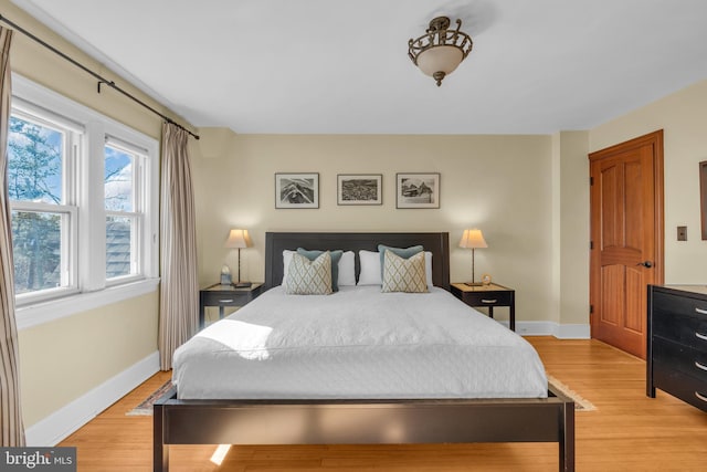 bedroom featuring light wood-type flooring