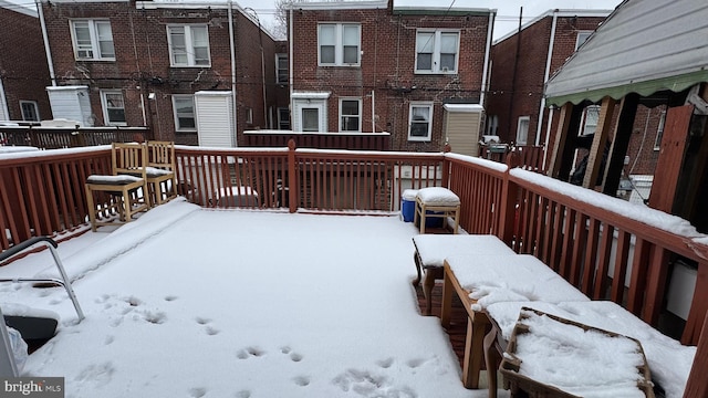 view of snow covered deck