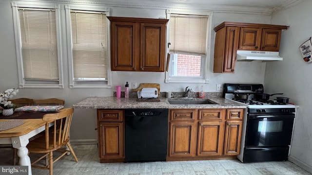 kitchen featuring sink and black appliances