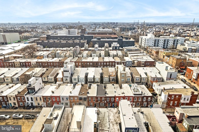 birds eye view of property featuring a city view