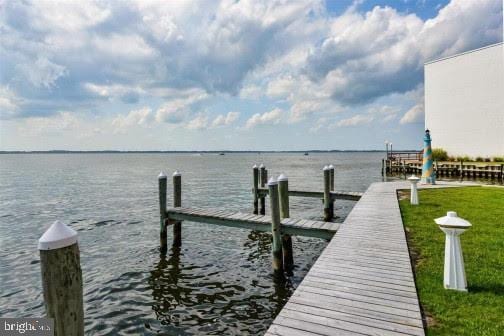 view of dock with a water view