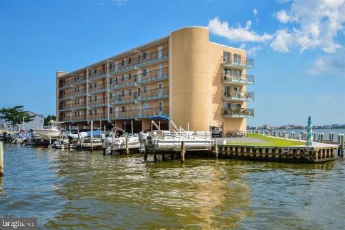 dock area with a water view