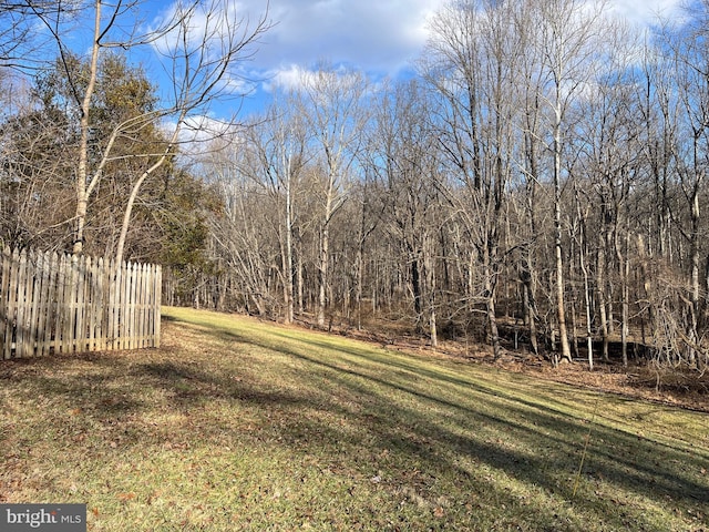 view of yard with fence