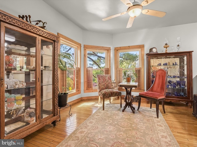 3137 18th St NE, Washington, DC 20018 - sitting room with hardwood / wood-style floors, a ceiling fan, and baseboards