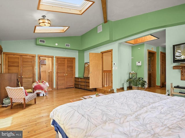 3137 18th St NE, Washington, DC 20018 - bedroom with a closet, wood finished floors, visible vents, and a skylight