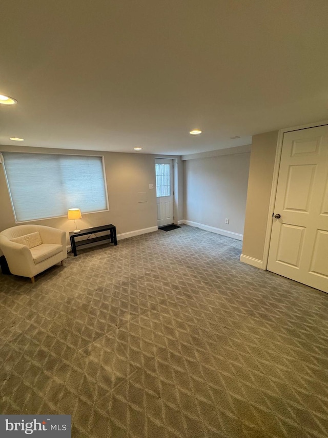 unfurnished room with carpet, baseboards, and recessed lighting