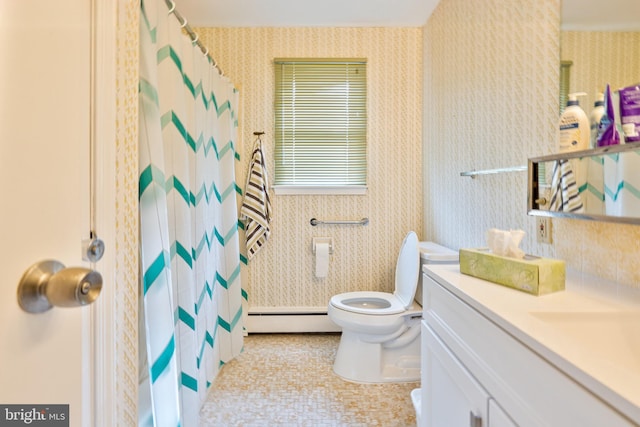 bathroom with vanity, a baseboard heating unit, and toilet