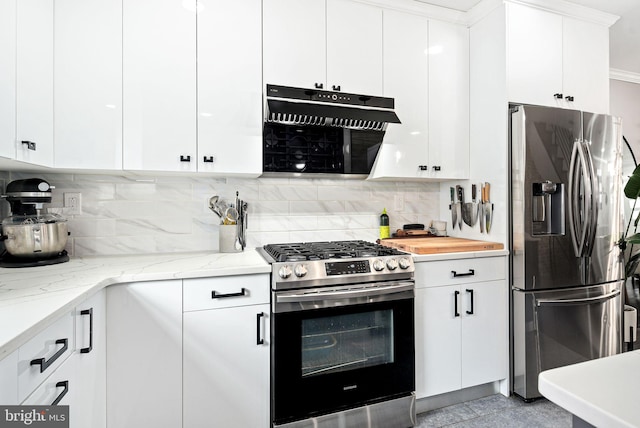 kitchen featuring white cabinetry, stainless steel appliances, light stone countertops, and extractor fan