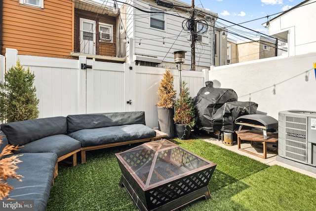 exterior space featuring grilling area and central AC