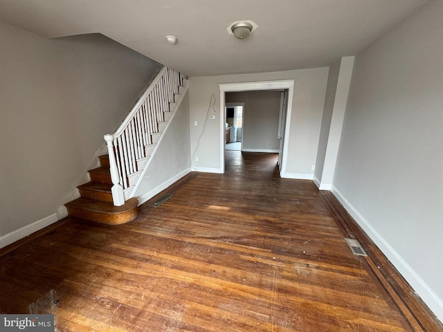 stairs with wood-type flooring