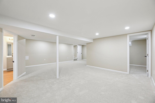 basement with light carpet