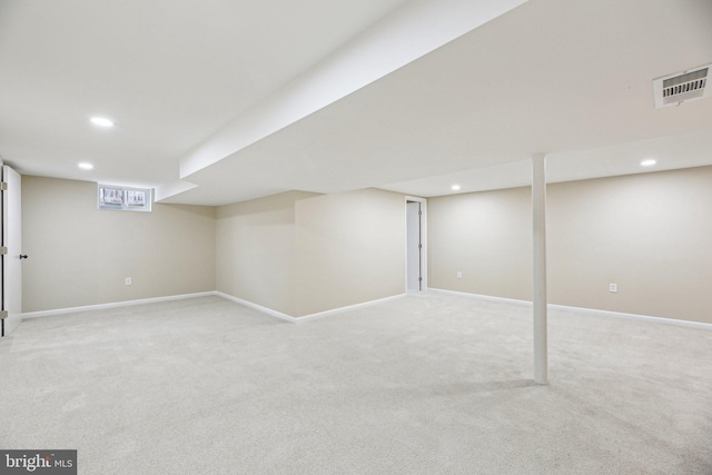 basement with light colored carpet