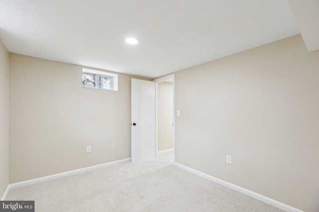 basement with light colored carpet