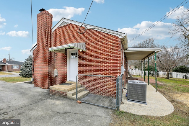 view of front of house with cooling unit