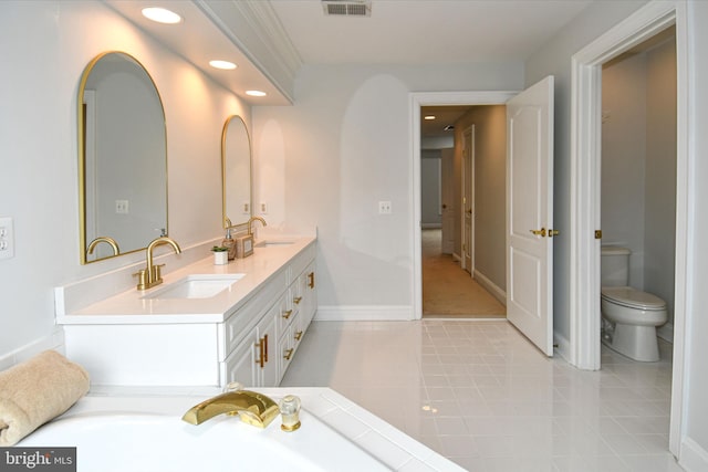 bathroom featuring tile patterned floors, visible vents, recessed lighting, and a sink