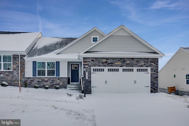 craftsman-style house featuring a garage