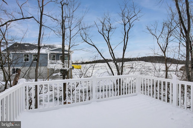 view of snow covered deck