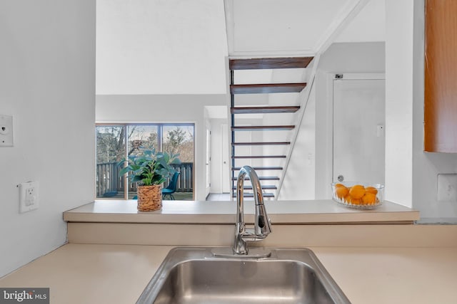 kitchen with light countertops and a sink