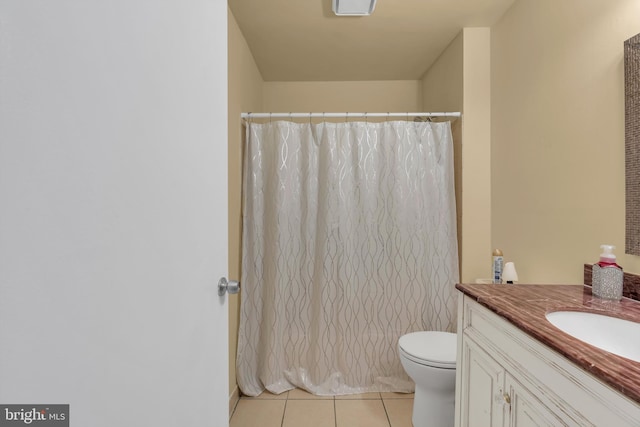 full bath featuring toilet, curtained shower, tile patterned flooring, and vanity