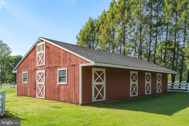 view of barn with an exterior structure