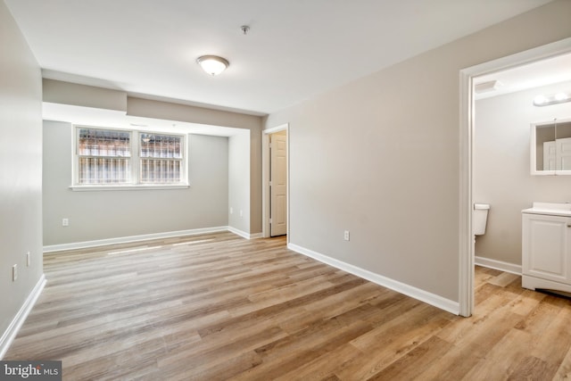 unfurnished bedroom featuring light hardwood / wood-style floors