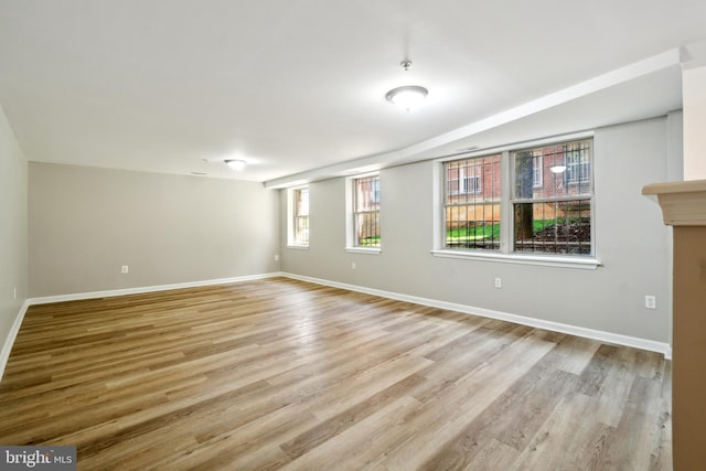 spare room featuring light hardwood / wood-style flooring