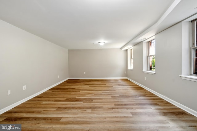 spare room featuring light hardwood / wood-style flooring