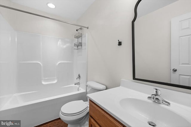 full bathroom featuring vanity, shower / bathtub combination, and toilet