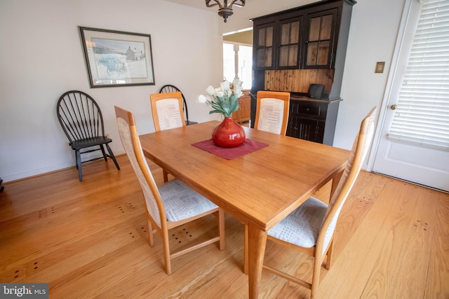 dining area featuring light wood-type flooring