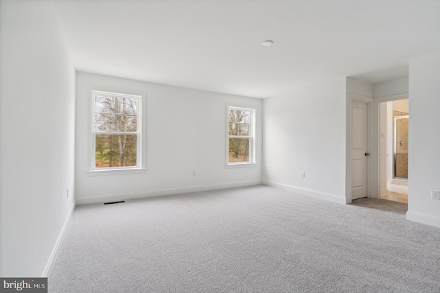 view of carpeted spare room