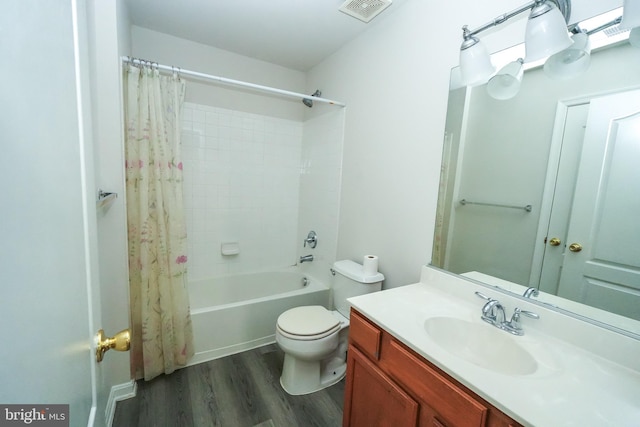 full bathroom with shower / bath combination with curtain, vanity, toilet, and hardwood / wood-style floors