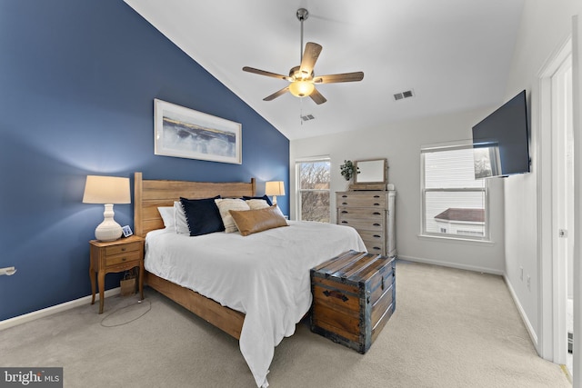 bedroom with visible vents, lofted ceiling, carpet, and baseboards