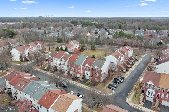 birds eye view of property with a residential view