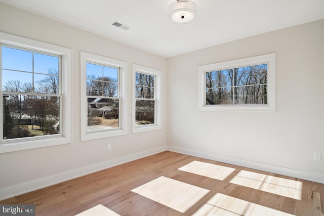 empty room featuring light hardwood / wood-style floors